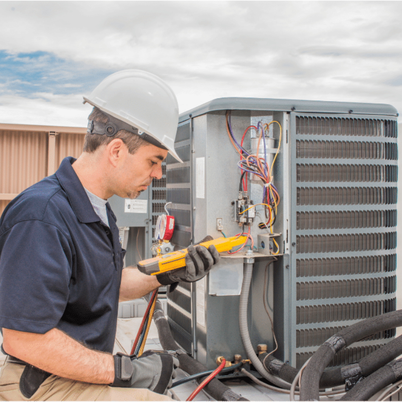 Mount Brydges Heating & Cooling HVAC technician on a service call in Mount Brydges, Ontario